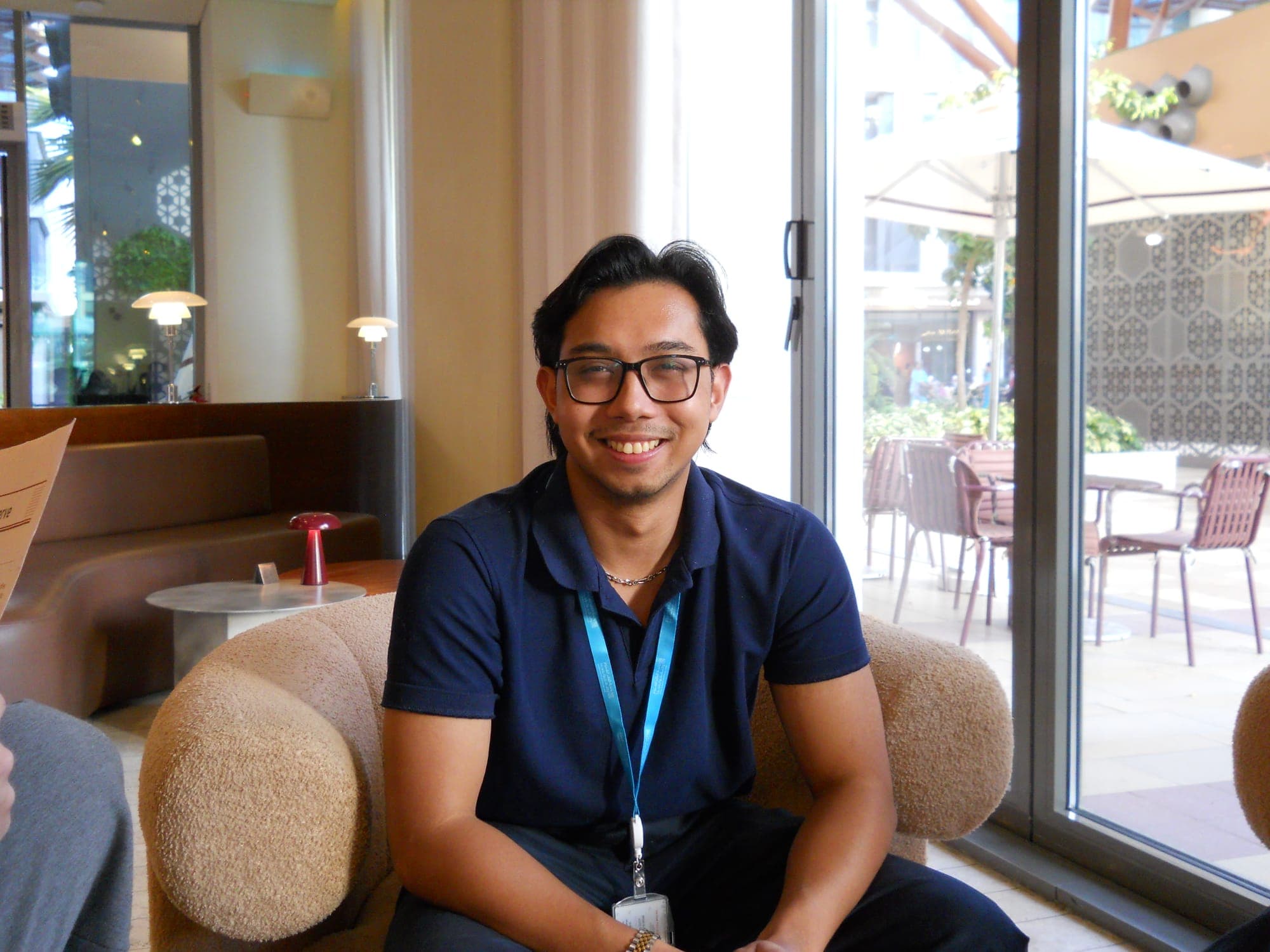 Gabriel smiling during a professional event